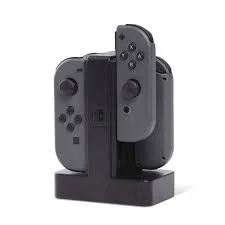 PowerA Joy-Con Charging Dock for Nintendo SwitchThe Joy-Con Charging Dock is the easiest solution for charging your Nintendo Switch Joy-Con Controllers. Charge 4 Joy-Con Controllers at a time for multiple players, or keep an extra pair charged for single players to switch out. Simply slide the Joy-Con Controllers down and wait until each charge LED turns green!
<ul>
 	<li>Charges up to 4 Joy-Con Controllers simultaneously</li>
 	<li>Individual LEDs indicate charge level for each Joy-Con</li>
 	<li>Easy slide-in design connects each Joy-Con to charger</li>
 	<li>Weighted base for stability</li>
 	<li>Powered via USB</li>
 	<li>Officially licensed for Nintendo Switch</li>
</ul>