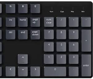 Keychron K5SE - RGB Backlight LED Hot-Swap Optical Banana Switch Full Size Layout 104 Keys Wireless Mechanical KeyboardThe Keychron K5 SE is an ultra-slim, hot-swappable Bluetooth mechanical keyboard with a full-size layout, including a number pad and dedicated keys for screenshot and Siri (Cortana). It offers dual connectivity, allowing you to connect with up to 3 devices via Bluetooth 5.1 or wired mode with USB Type-C. The keyboard is compatible with both macOS and Windows, featuring a unique Mac layout with multimedia keys. You can customize your typing experience with hot-swappable low-profile Keychron optical switches, which are 40% slimmer than conventional switches. The K5 SE is reinforced with an aluminum top case and SGCC galvanized steel plate, making it durable and stable for wireless transmission, with two adjustable feet for comfortable typing.